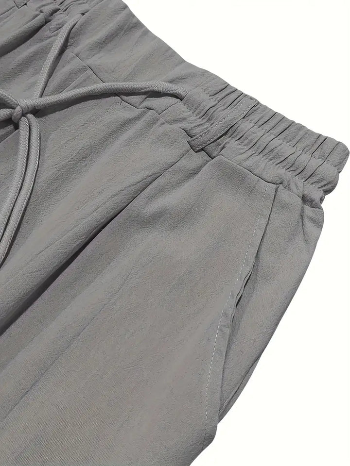 PANTALONS LARGES EN LIN AVEC CORDON